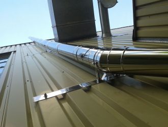 Edelstahlschornstein trifft Blechfassade - Kreis Ravensburg