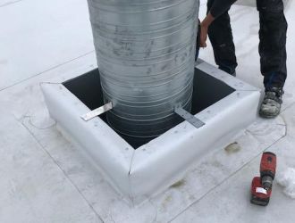 Schornstein mit Ablufthaube in Biberach